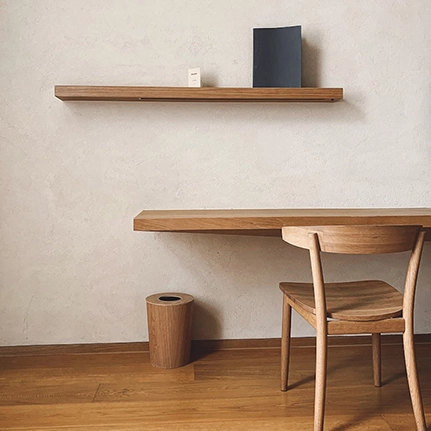 Minimalist interior with a desk and chair