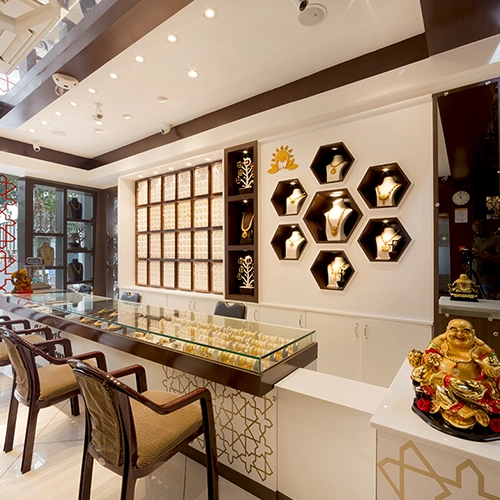 A luxurious interior design for Muhurtham Jewellers, combining elegance with functionality.